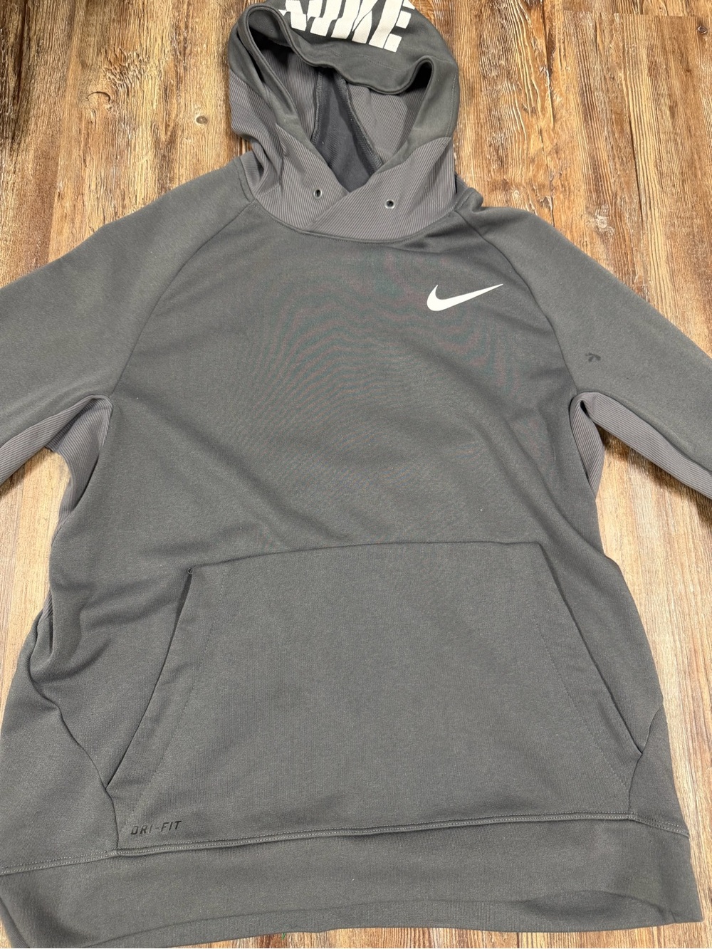 Grey short sleeve Nike Dri-Fit Hoodie
Size L